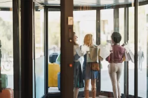 Types of automatic doors with women walking through